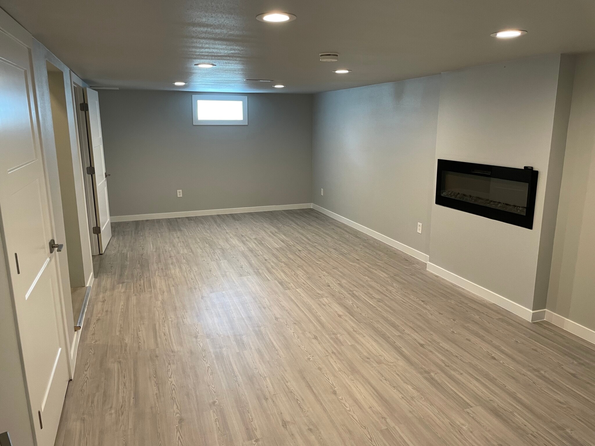 Downstairs Living Room - 3011 N Stout Rd