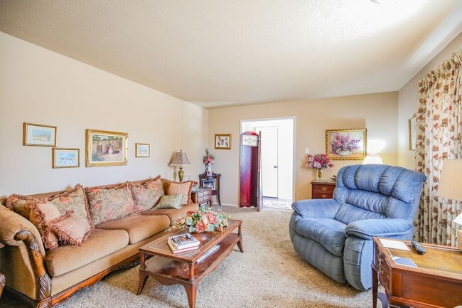 Building Photo - Three Bedroom Home with Plush Backyard
