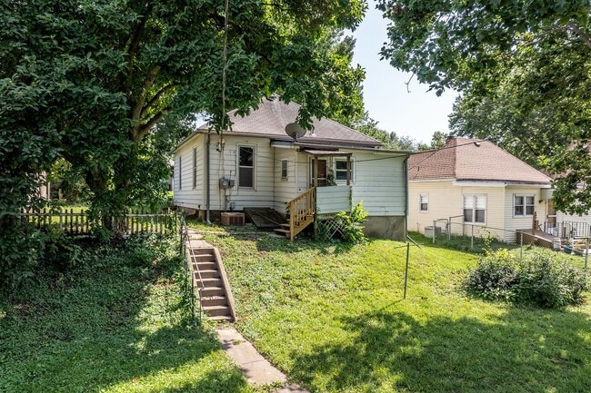 Building Photo - Remodeled 2-Bedroom Bungalow with Detached Garage & Large Backyard