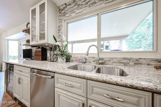 Building Photo - 9085 E Windrose Dr