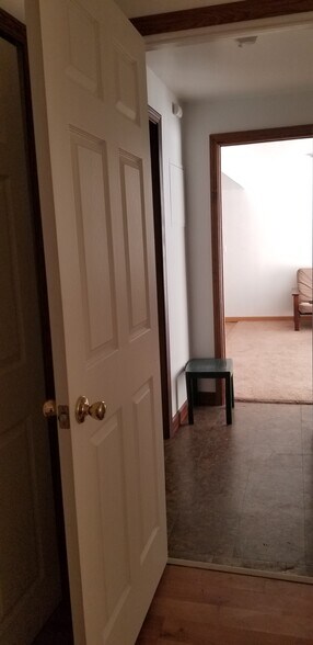 View of livingroom from downstairs apartment bedroom door - 2116 Thaler Ave