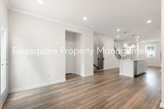 Building Photo - Stylish 3-Level Townhome with Bonus Suite, Deck & Garage – Near I-540 and Shopping