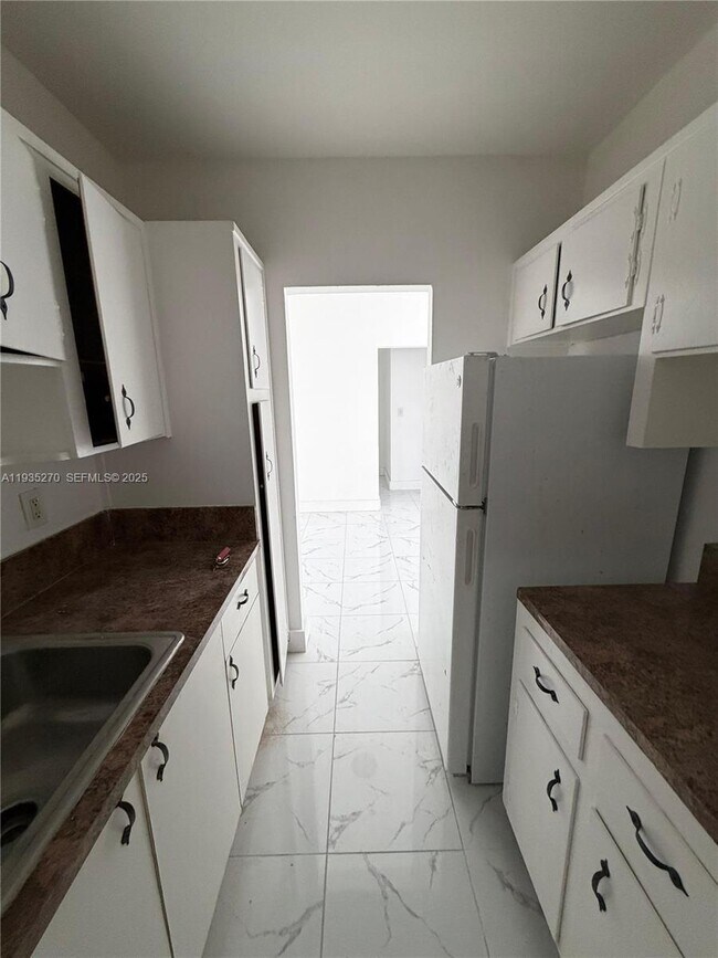 Building Photo - 7730 Dickens Ave