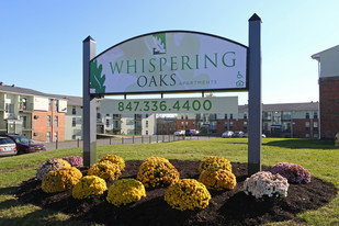 Building Photo - Whispering Oaks Apartments