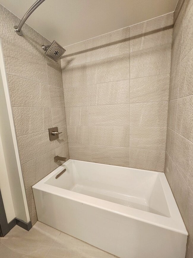 Building Photo - Brand New Urban One Bedroom Condo in Totem...