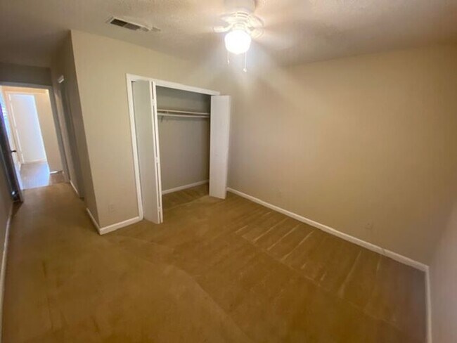 Building Photo - NOW AVAILABLE! Charming 2-Bedroom, 2-Bathroom Single-Level Townhome