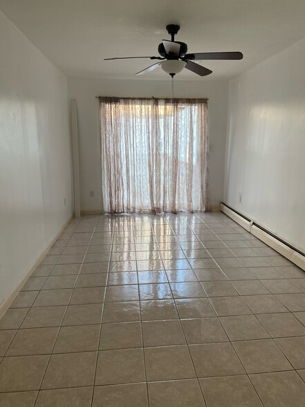 Building Photo - 8815 Pitkin Ave