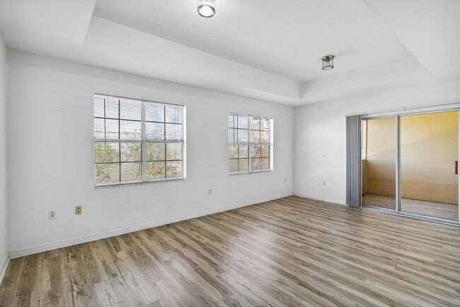 Building Photo - Spacious 1-Bedroom Condo for Annual Rent available now in gated Villagio Community