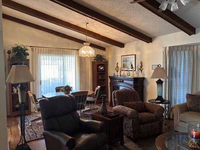 Building Photo - Welcome to this charming 2-bedroom, 2-bathroom home. Available April through October 2026!