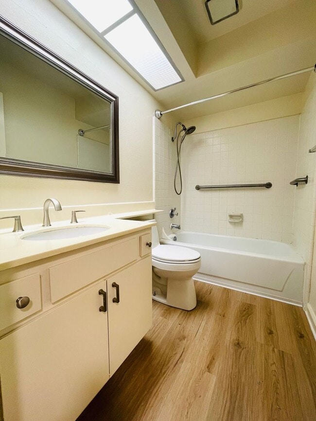 Building Photo - charming 3-bedroom, 2-bathroom home nestle...