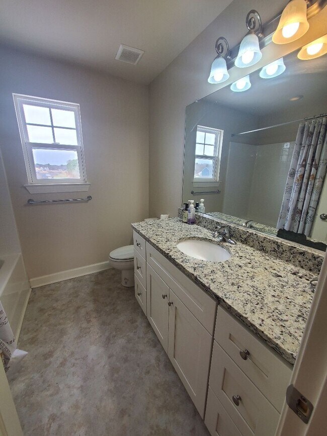 Building Photo - Luxurious 4BR/2.5BA Home with Spacious Living Spaces and Elegant Touches