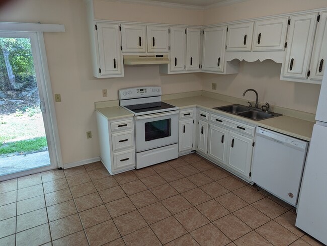 Kitchen upgraded cabinets w/tile floor - 251 Knight Dr