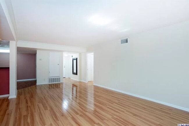 Building Photo - 5009 Woodman Ave