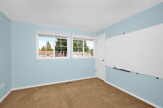 Building Photo - Sunny 5 Bedroom Home with 3 Car Garage in Quiet Neighborhood