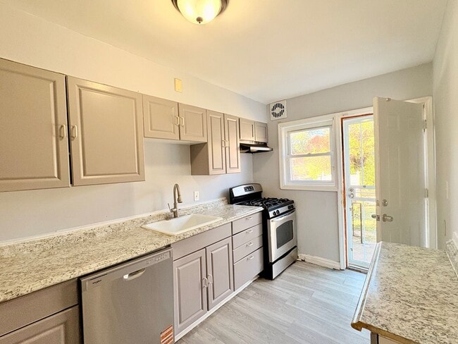 Building Photo - Charming Brick Home with Finished Basement...