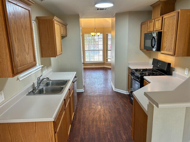 Building Photo - 305 N Heatherwilde Blvd