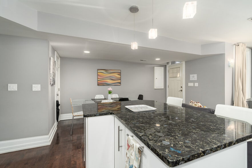 kitchen with view of dining area and front door - 403 P St NW