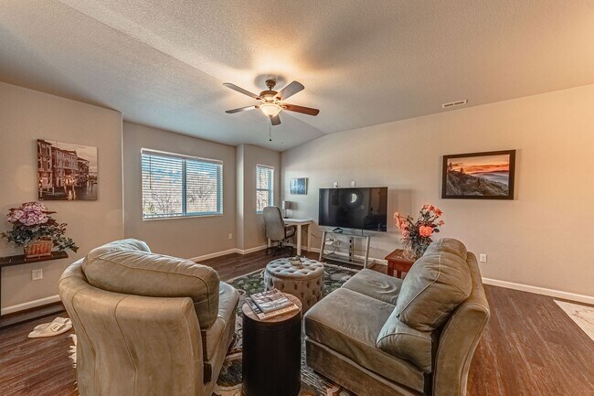 Building Photo - Cozy Fully Furnished  COS Townhome