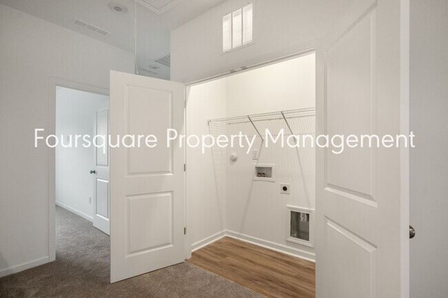 Building Photo - Spacious 3-Bed / 2.5-Bath Townhome with First-Floor Den, Hardwood Floors & 1-Car Garage – Wendell...