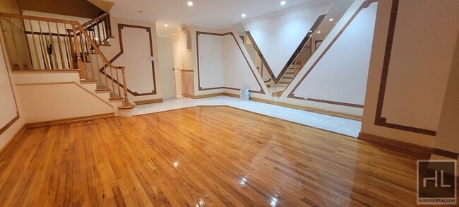 Primary Photo - Spacious 3-Bedroom Duplex Home with Huge L...