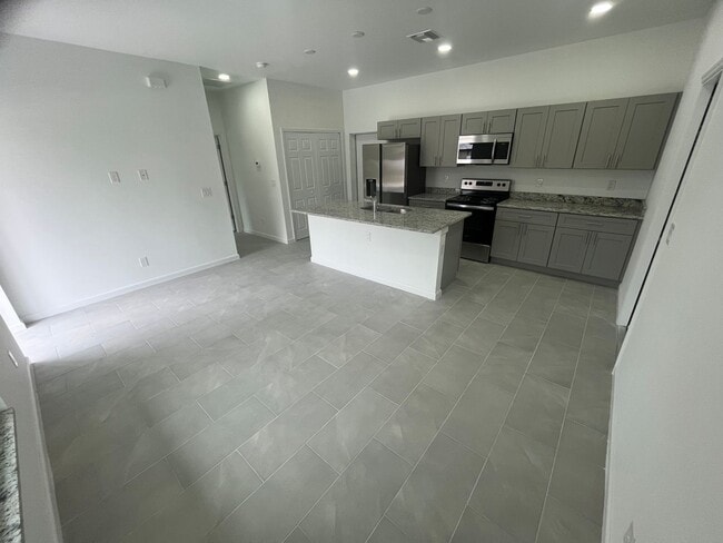 Building Photo - BRAND NEW ONE BEDROOM, ONE BATH-ONE CAR GARAGE- LEHIGH ACRES