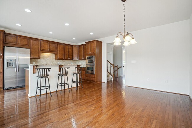 Building Photo - This beautiful townhome spans three finished levels and over 2800 square feet.