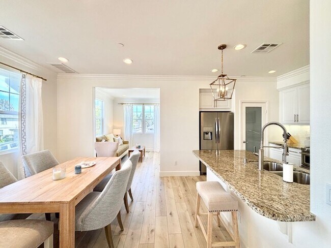 Building Photo - 4 Bedroom + 3.5 Bathroom Townhome | The Westerlies | Unfurnished