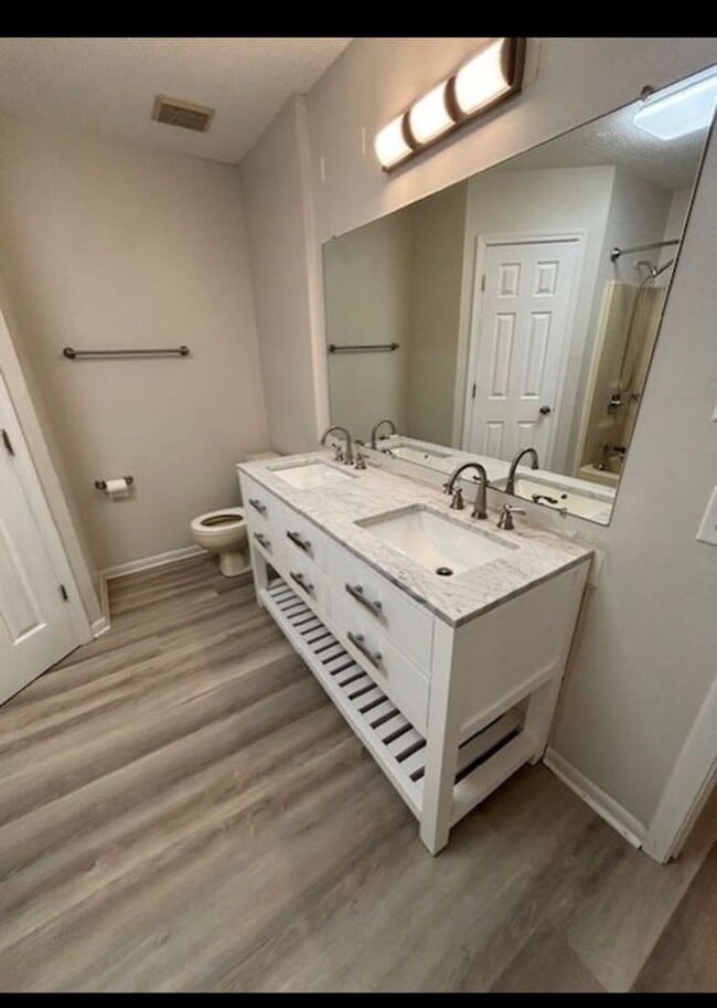 Building Photo - Affordable Living with Comfort & Convenience