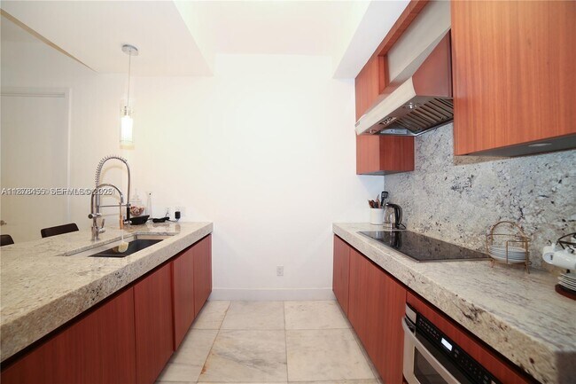 Building Photo - 9705 Collins Ave