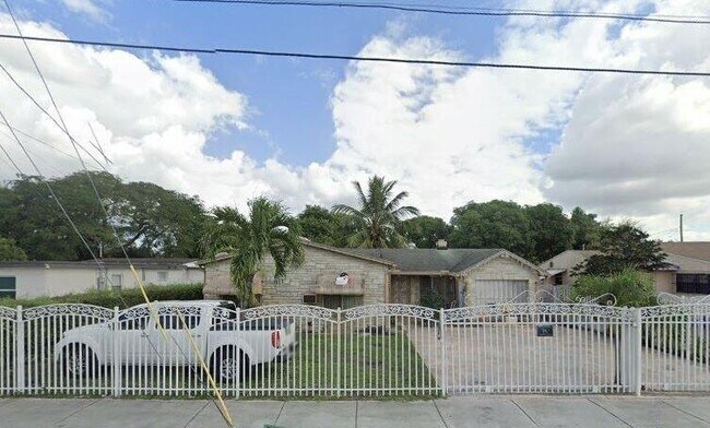 Building Photo - 10335 NW 26th Ave