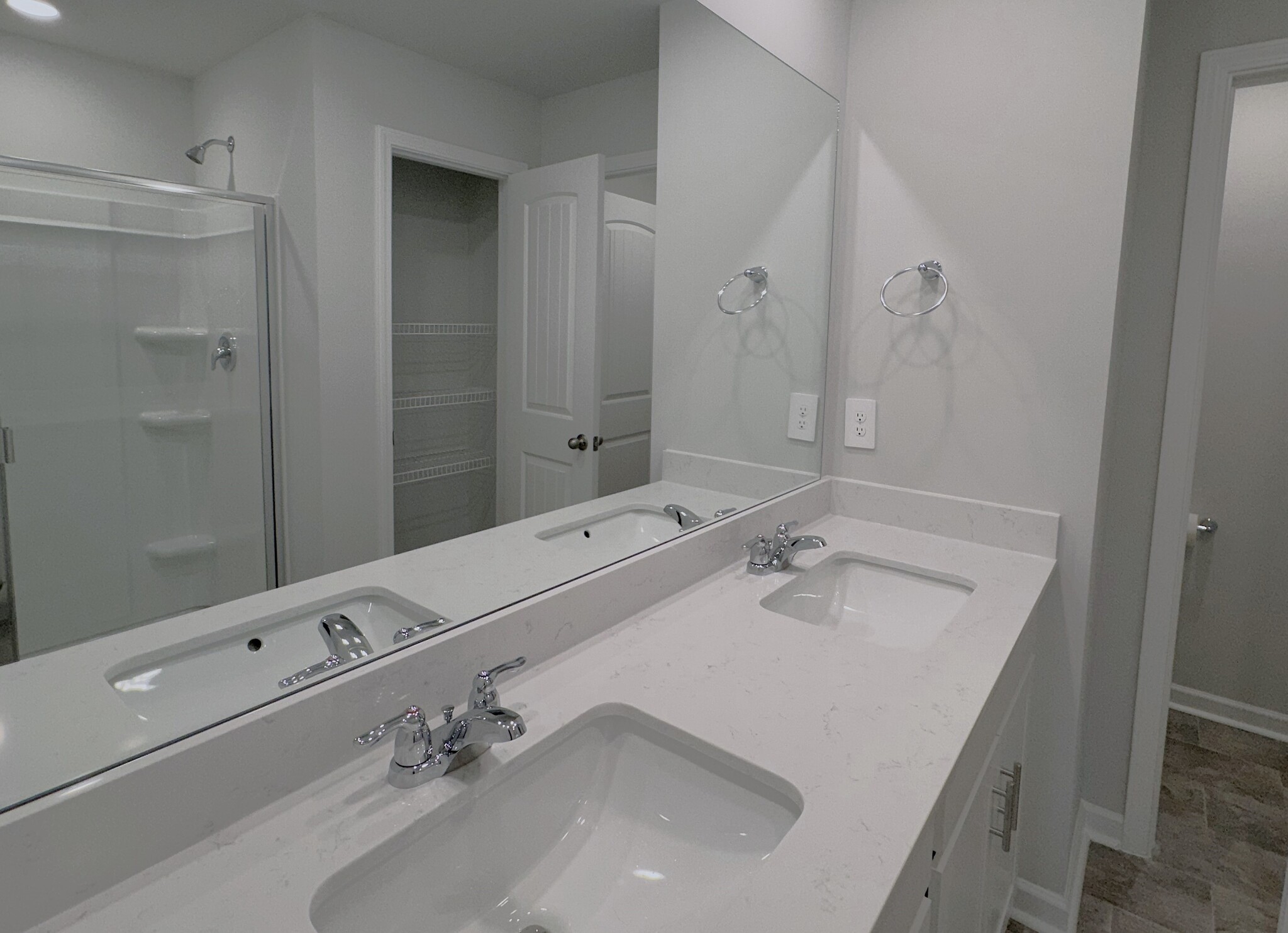 The master bathroom also has a double vanity. - 403 Augustine Dr