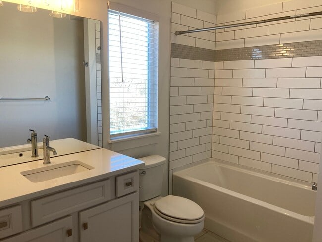 Building Photo - 3 bedroom, 3.5 bath, Spacious & Open Floor...