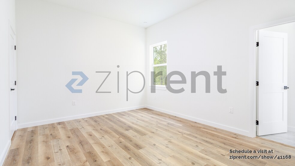 Building Photo - 8202 N Triana Dr