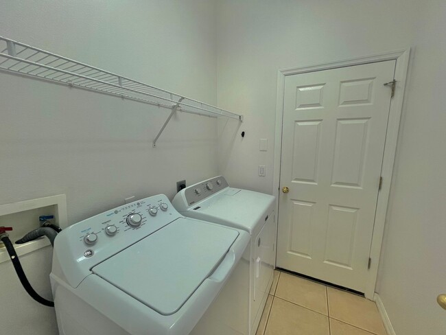 Building Photo - Spacious 4-Bed, 3-Bath Home in Guard-Gated...
