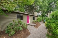Building Photo - Single-Level 2 Bedroom 2 Bath Duplex with Private Deck and Attached Garage