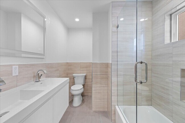 Building Photo - COMPLETELY REMODELED, BRIGHT & AIRY, TRI-LEVEL HOME W/ TOP-FLOOR GREAT ROOM LIVING SPACE, 2-CAR G...