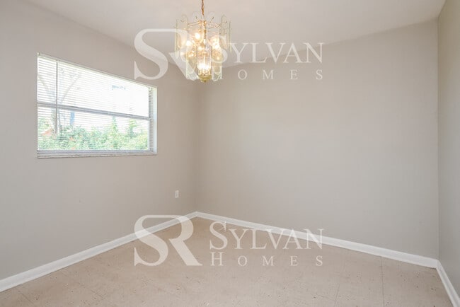 Building Photo - The living is easy in this 3 bedroom, 1 ba...