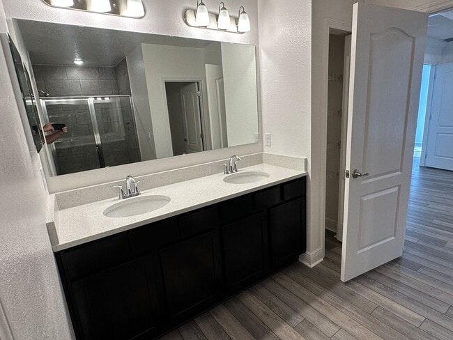 Building Photo - Nearly New 3 Bedroom Smart Home with Lawn Care Included!