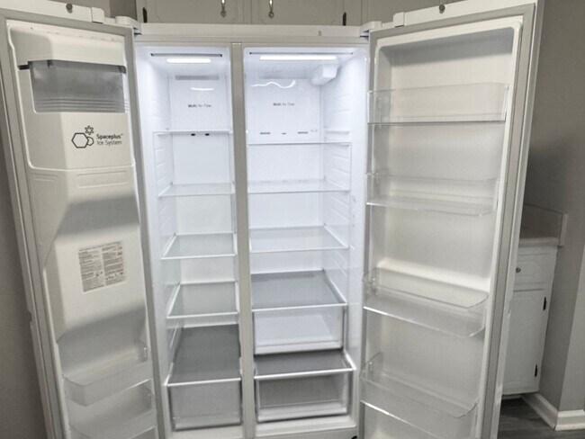 Building Photo - Cathedral Ceiling for a big open feel!