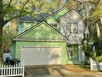 Building Photo - Coastal Charm: Luxurious 4-Bedroom Home in Gated Community Near the Intracoastal