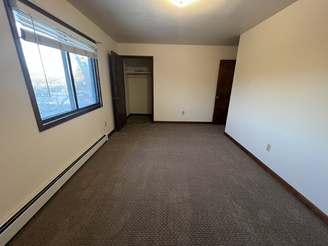 Building Photo - "Cozy 2-Bed Condo with Fireplace Oasis in ...