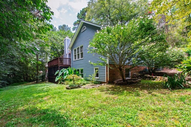 Building Photo - Spacious 4-Bedroom Carrboro Home with Dual Primary Suites & Community Amenities
