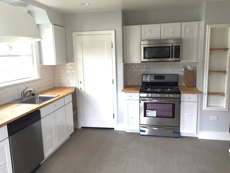 Brand new kitchen. All new stainless steal gas range, fridge, dishwasher. - 2628 Northeast Ainsworth Street