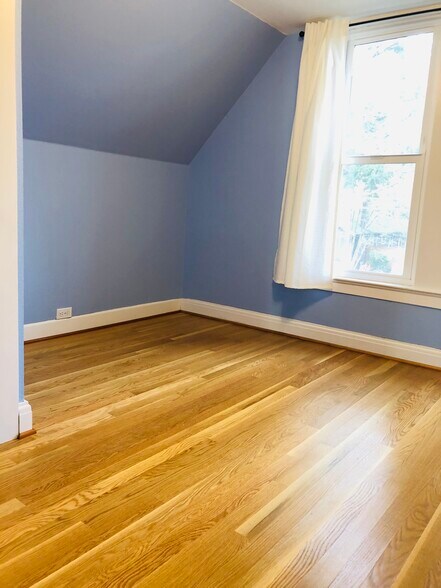 Second floor bedroom 2- A twin bed can fit end to end in the space to the left of the window - 5336 SE 44th Ave