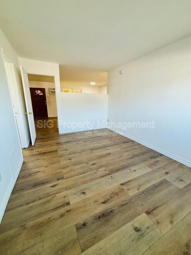 Building Photo - 10635 Sherman Grove Ave