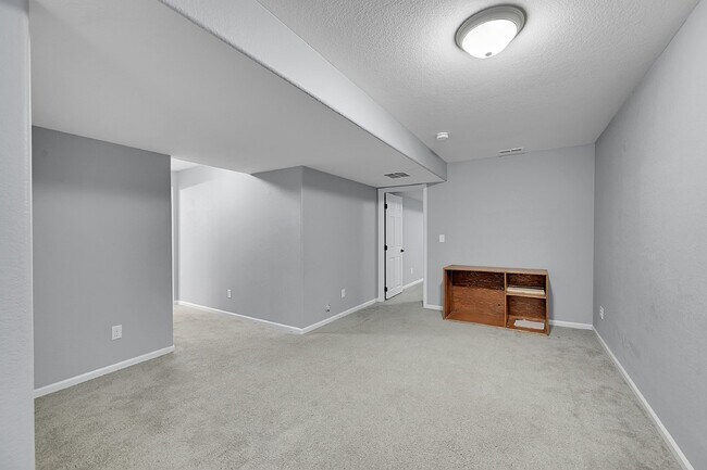 Building Photo - $2,540.95, 4 bed, 3.5 bath Home in Co Springs with Fenced in Yard and Finished Basement!