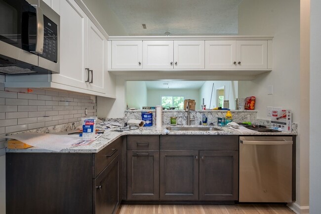 Building Photo - 2 Bed, 2 Bath Renovated Townhouse – Single-Level Living – $1,800/month