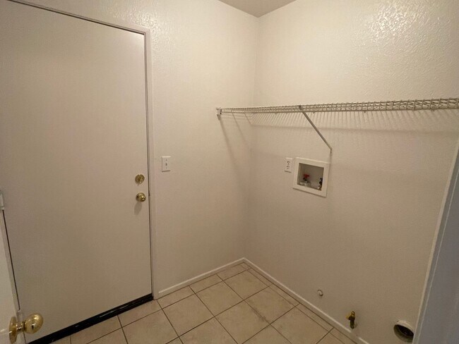 Building Photo - Adelanto Home-3 Bedrooms,2 Bathrooms, Laminate Floors, Indoor Laundry Room, Large Back Yard