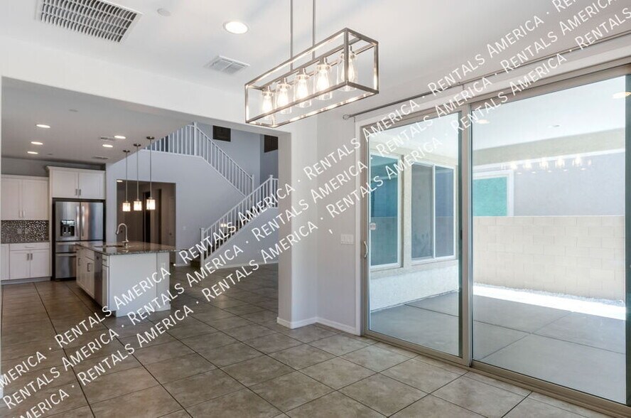 Building Photo - 5768 S Tiger Lily Pl