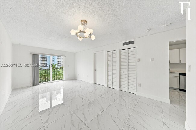 Building Photo - 6965 Harding Ave